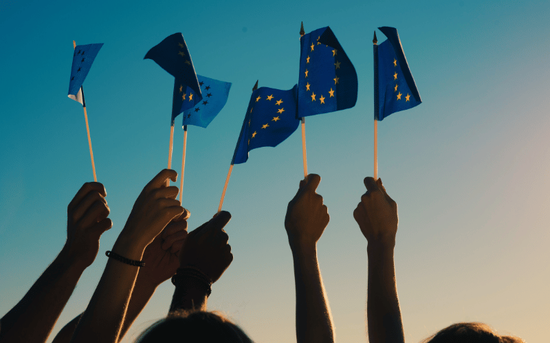 Image of people holding european flags
