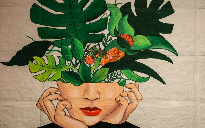 Illustration of a woman thinking with plants growing out of her brain