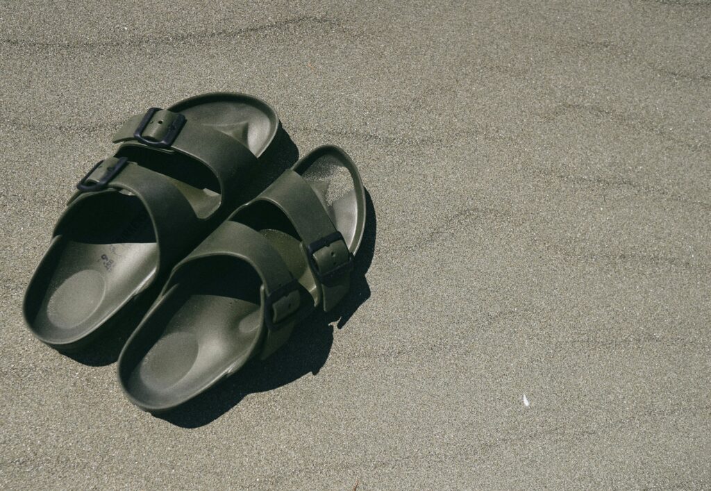 image of Birkenstock shoes on the sand