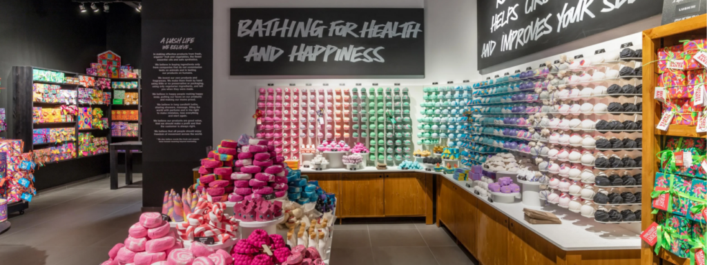 Colorful bath products displayed inside a Lush store